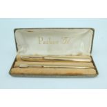 A 1960s cased Parker "51" fountain pen and propelling pencil set, the bodies marked 12 ct rolled
