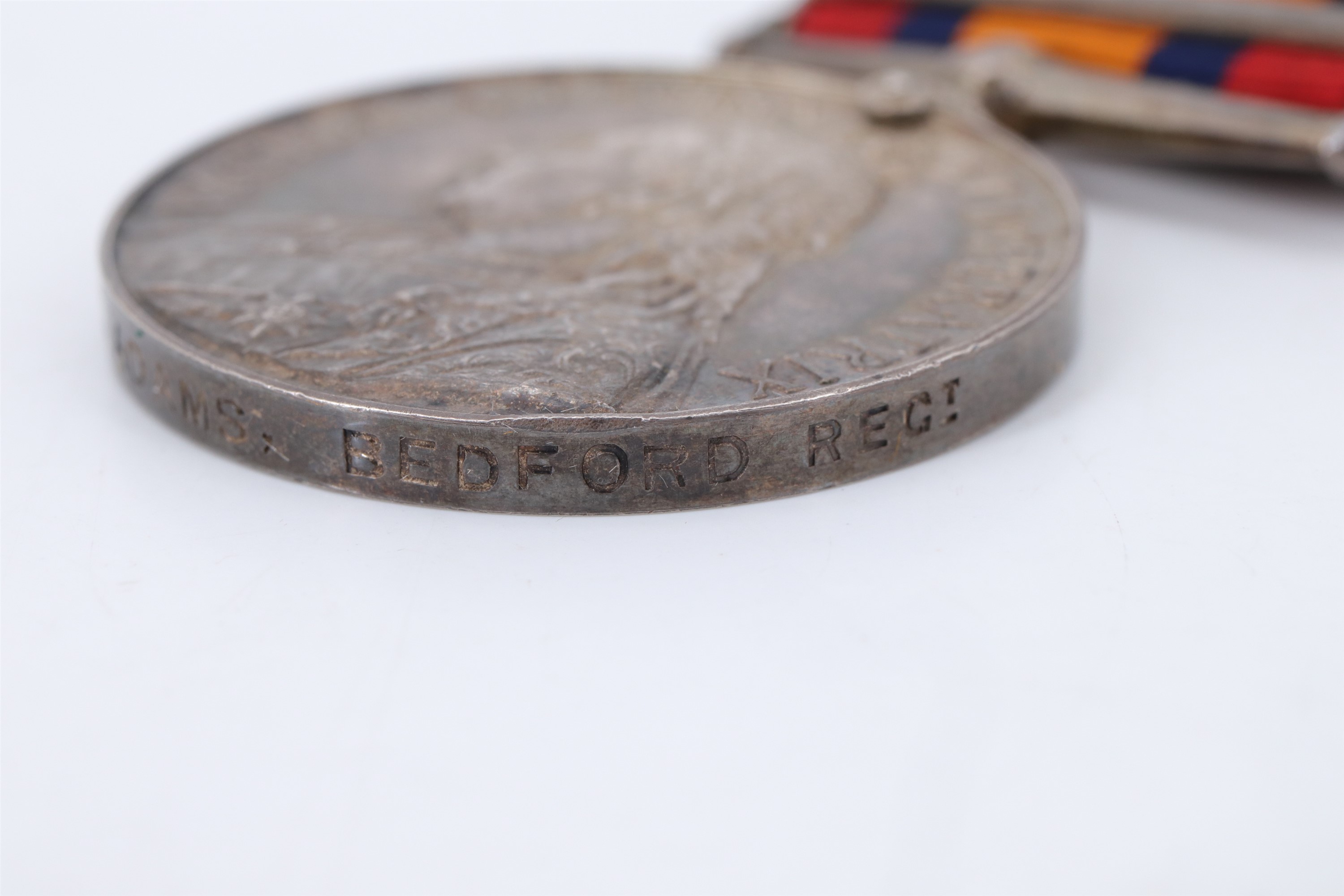 An India Medal with Relief of Chitral 1895 clasp, engraved to 3306 Pte G Adams 1st Bn Bedford - Image 4 of 9