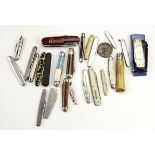 24 folding pocket knives, including and Opinel, and three marked for 'Ovoline Motor and Tractor