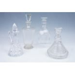 An old reproduction Regency prism-cut Rodney decanter, an Art Deco cut glass decanter, a late