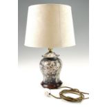 A contemporary table lamp, depicting blossoms and butterflies, 56 cm