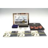 Second World War commemorative coin packs etc together with a "Battle for Britain 1939-45" medal