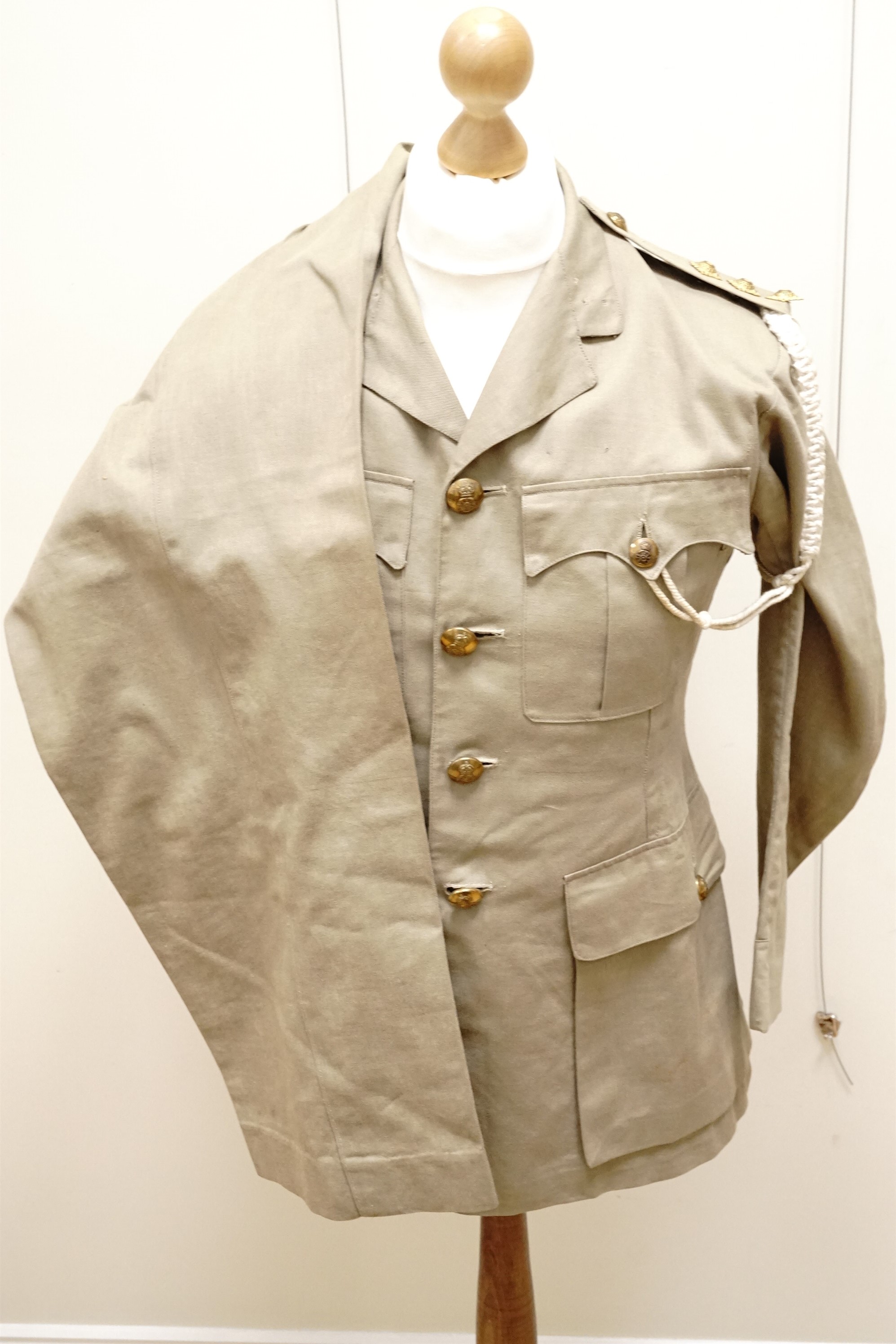 A Yorkshire Dragoons captain's khaki drill tunic and trousers, circa 1940s