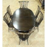 An Ercol dining table and six chairs