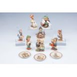 Eight Hummel figurines together with three Hummel miniature plates