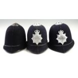 Two Cumbria Constabulary Custodian helmets together with one other police night helmet