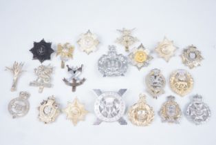 A quantity of British Army Staybrite cap badges, etc