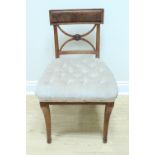 A Regency mahogany sabre-legged standard chair
