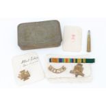A 1914 Princess Mary gift tin including inscribed New Year card, bullet pencil, Wiltshire Regiment