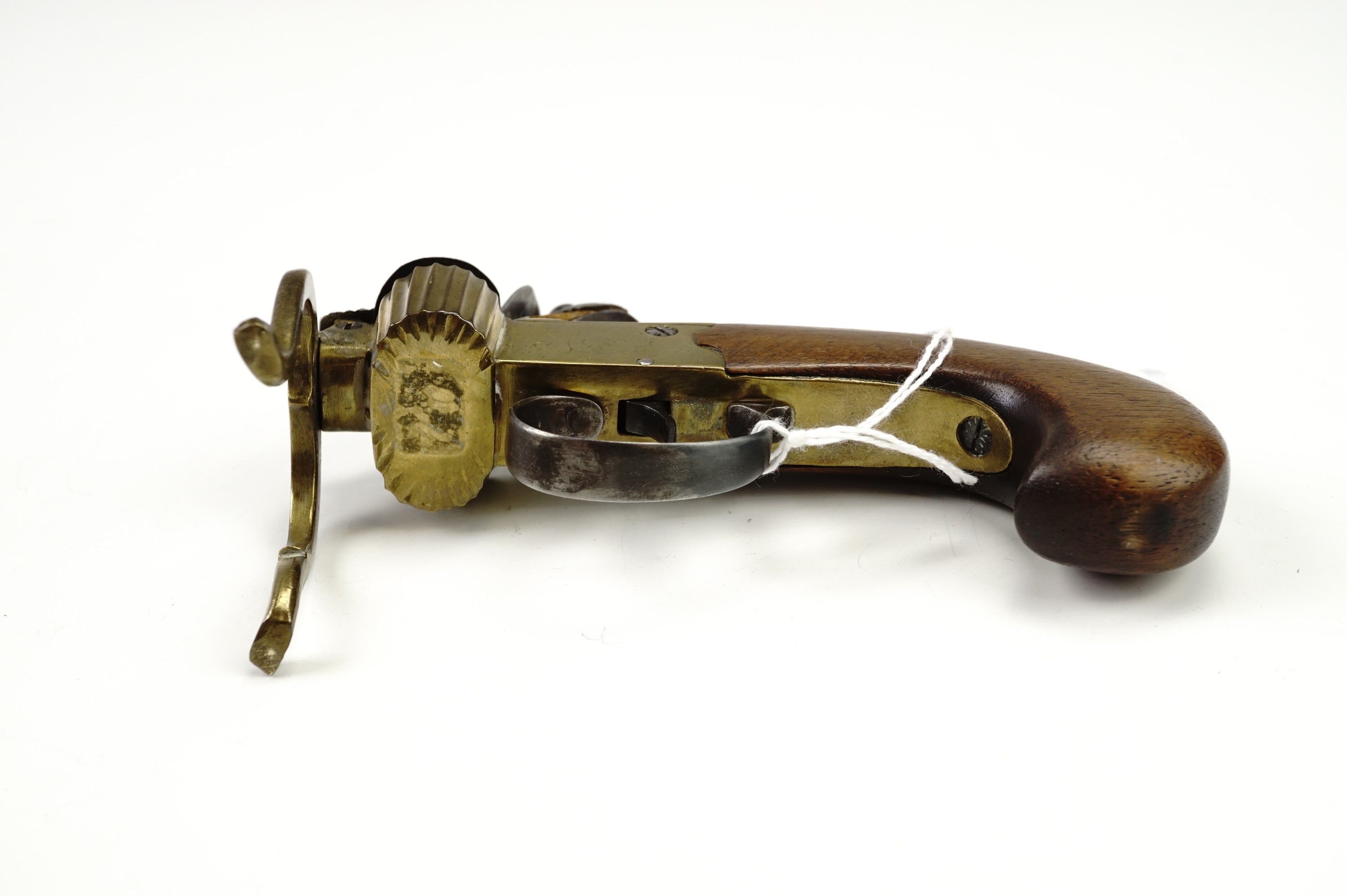 A flintlock tinder box candle lighter, having a brass body with steel cock and frizen on a walnut - Image 3 of 7