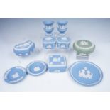 Ten items of Wedgwood blue Jasperware, including four lidded boxes, vases etc. and a Victorian