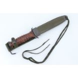 A reproduction US Army M3 fighting knife