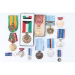 A Kuwait Liberation medal and sundry other medals
