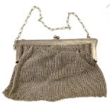 An early 20th Century lady's mesh evening bag, 17 cm x 15 cm