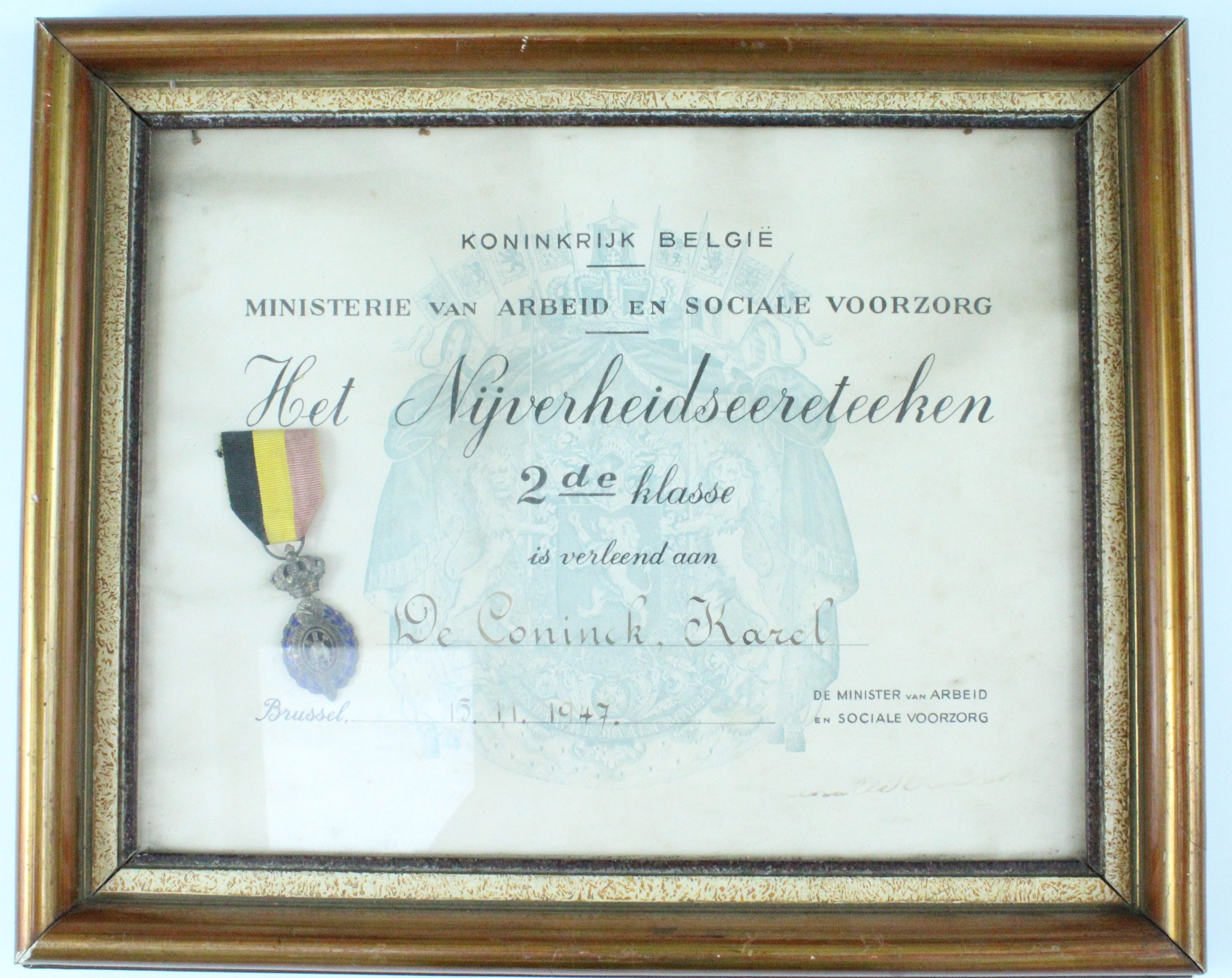 A Belgian Labour Decoration 2nd class, framed with 1947 award document