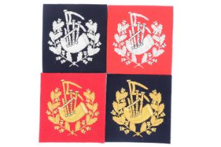 Four pipers' bullion-embroidered arm badges