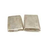 Two Art Deco silver matchbook cases, having engine turned front and back and a vacant cartouche,