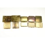 A collection of second quarter 20th Century gilt metal cigarette cases, including a copper case, a