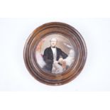 A Victorian Pratt pot lid depicting Prince Albert, in turned wooden frame, 14 cm
