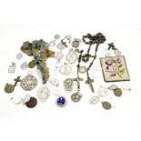 A large quantity of religious medallions, crucifixes etc