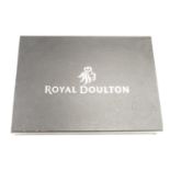 A boxed set of Royal Doulton place mats