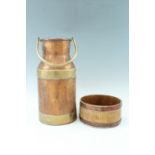 A copper and brass churn, together with a coopered wooden grain measure, churn 58 cm