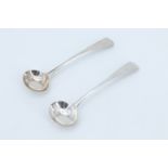 A pair of Georgian silver salt spoons