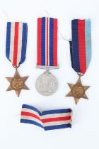Three Second World War British campaign medals including a France and Germany Star