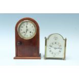 Two early 20th Century dome top mantle clocks, comprising a brass clock, having a French drum
