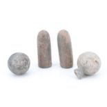 A small group of cast lead musket shot and 19th Century rifle bullets