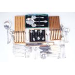 A quantity of electroplate flatware, including a cased set of bean coffee spoons etc