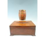 An oak biscuit barrel, 19 cm, together with a wooden box, 31 cm x 25 cm x 14 cm