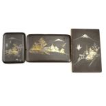 Three Japanese Shakudo cigarette cases, second quarter 20th Century