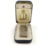 A cased Dunhill "Rollagas" cigarette lighter