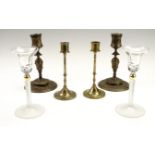 A pair of Belle Epoque cast brass candlesticks, and a modern pair of Indian brass candlesticks,