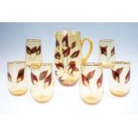 A 1960s Amber glass lemonade set with gilt and fern decoration