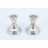 A pair of early 1970s silver candle stands, bearing Birmingham assay office bi-centennial marks, 7