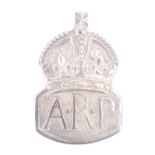 A 1938 silver ARP badge
