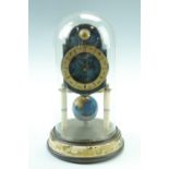 A late 20th Century Kaiser torsion clock, having a key wound movement, the pendulum modeled as a