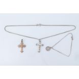 A mother of pearl and white metal crucifix, on a box link choker neck chain marked '925', a white