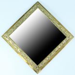 An early 20th Century small brass-framed bevel-edged wall mirror, 33 cm x 33 cm