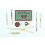 Victorian bone dressing table accessories including glove stretchers and button hooks, a thread