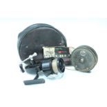A Garcia Mitchell 300 spinning reel together with a J.W.Young " Pridex " fly fishing reel