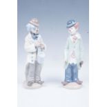 A pair of Lladro clown figurines, tallest 23 cm