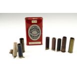 A Curtis and Harvey gunpowder tin together with early paper shotgun cartridges, cartridge cases etc,