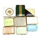 A group of vintage enamelled and similar cigarette cases