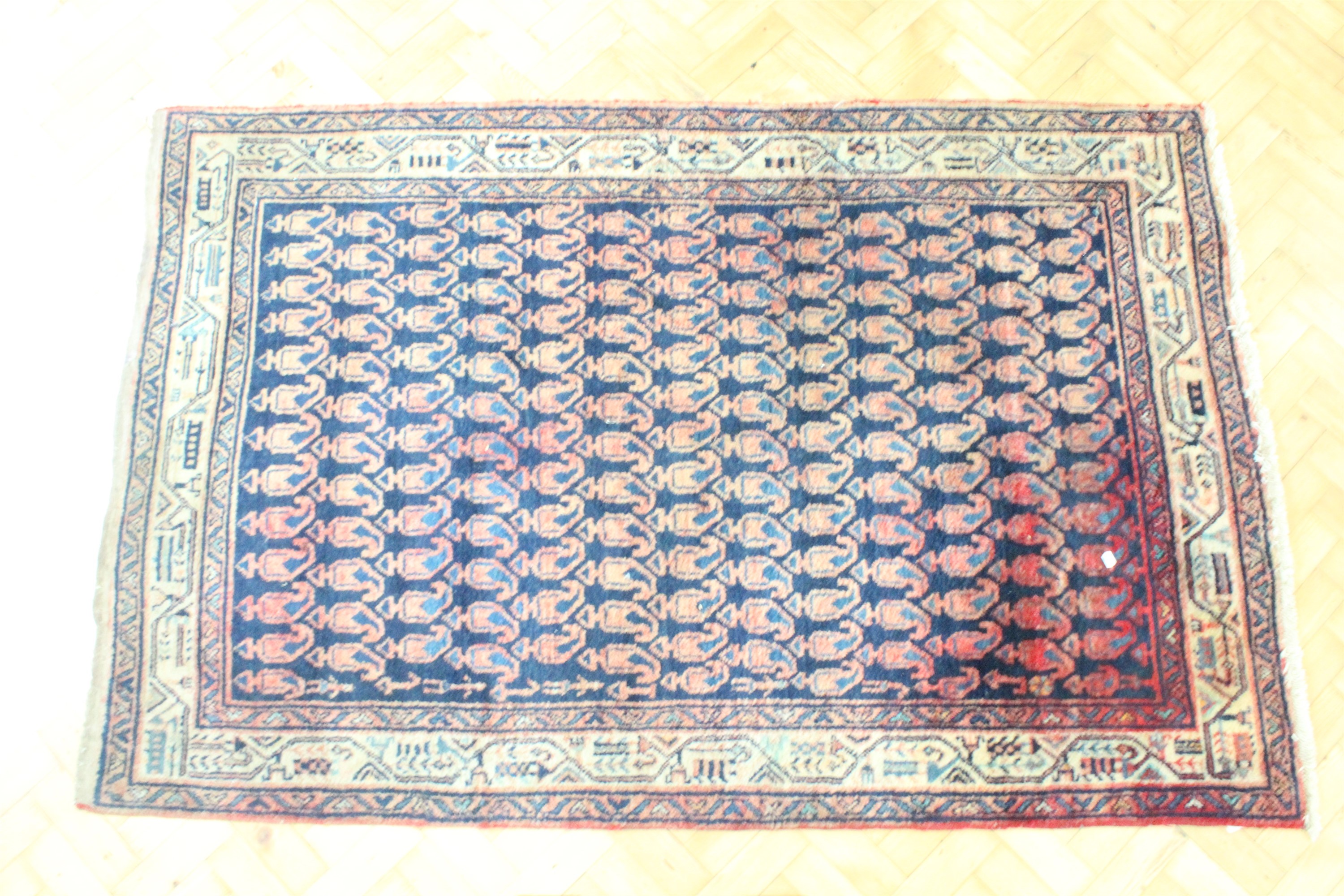 An Iranian Hamadan rug, 210 cm x 133 cm