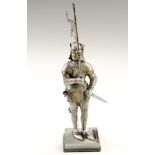A 1930s Austrian cold painted spelter table / cigar lighter, modelled as a medieval knight in armour