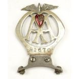 A 1916 AA car badge, number 91670, bearing an enamelled red heart subscription renewal token "