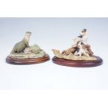 A Border Fine Arts otter, together with a Sherratt and Simpson figurine Jack Russell and rabbit